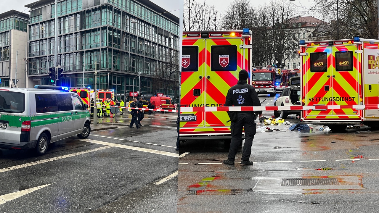 Auto fährt in München in Menschengruppe